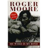 Roger Moore signed My Word is my Bond autobiography. Hardback book. Signed on inside title page Good