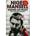 Nigel Mansell signed Staying on Track the autobiography. Signed on the inside title page by the