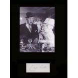 Minder George Cole. Signature mounted with picture as Arthur Daley.’ Professionally mounted in black