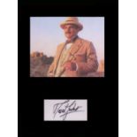 Poirot David Suchet. Signature mounted with picture as Poirot.’ professionally mounted in black to