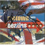Beatles/Motown autographed CD. CD of Motown Meets the Beatles signed on the front of the CD inlay