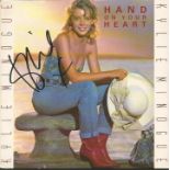 Kylie Minogue autographed record. 7 inch record for the song Hand on Your Heart signed clearly on