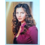 Charisma Carpenter autographed large photograph.  Good condition. All signed items come with a