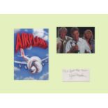 Airplane - Robert Stack. Signature of Robert Stack mounted with two pictures from the hilarious