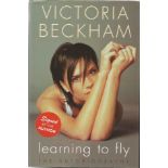 Victoria Beckham signed Learning to Fly - the autobiography hardback book.  Signed on inside title