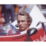 Niki Lauda. 10x8 picture in Formula 1 car. Excellent.  Good condition. All signed items come with