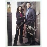 Eddie McLintock and Joanne Kelly autographed large photograph.  Good condition. All signed items