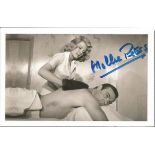 Mollie Peters signed 6 x 4 colour James Bond photo Good condition. All signed items come with a