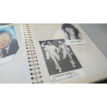 Autograph Collection. A4 sized photo album containing around 19 autographed photos, postcards and