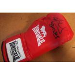 Joe Calzaghe autographed boxing glove. Red Lonsdale full size boxing glove autographed by boxer