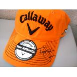 - Tony Jacklin signed golf cap. Authentic Callaway orange golf cap signed on the peak in striking