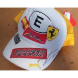 Fernando Alonso autographed cap. Puma Spanish Ferrari baseball cap autographed by Formula One driver
