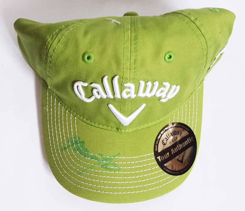 Colin Montgomerie signed golf cap. Official green Callaway golf cap autographed on the peak by Colin