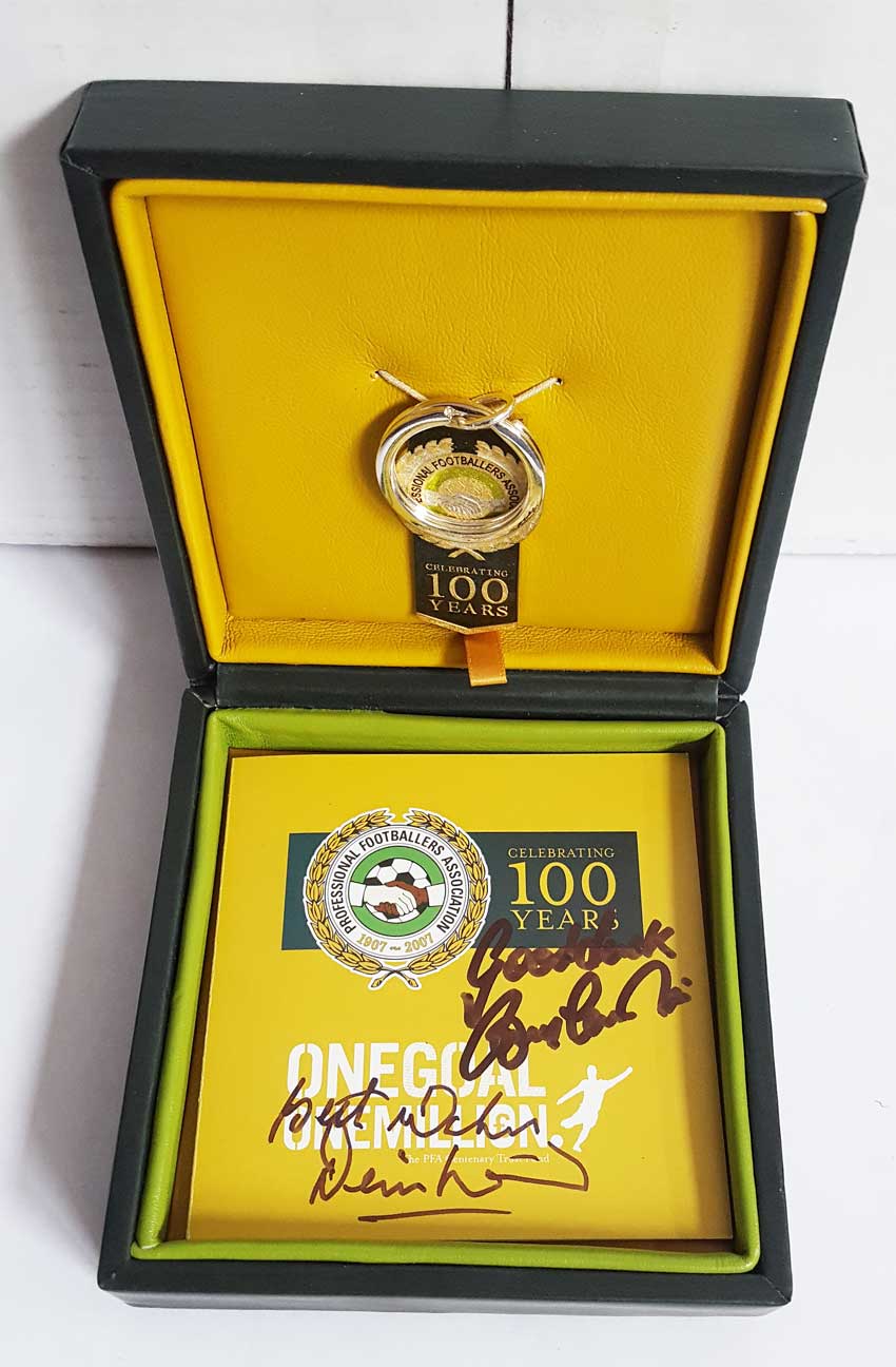 Denis Law and Bobby Charlton signed commemorative key ring. Nice little commemorative 100 Years of