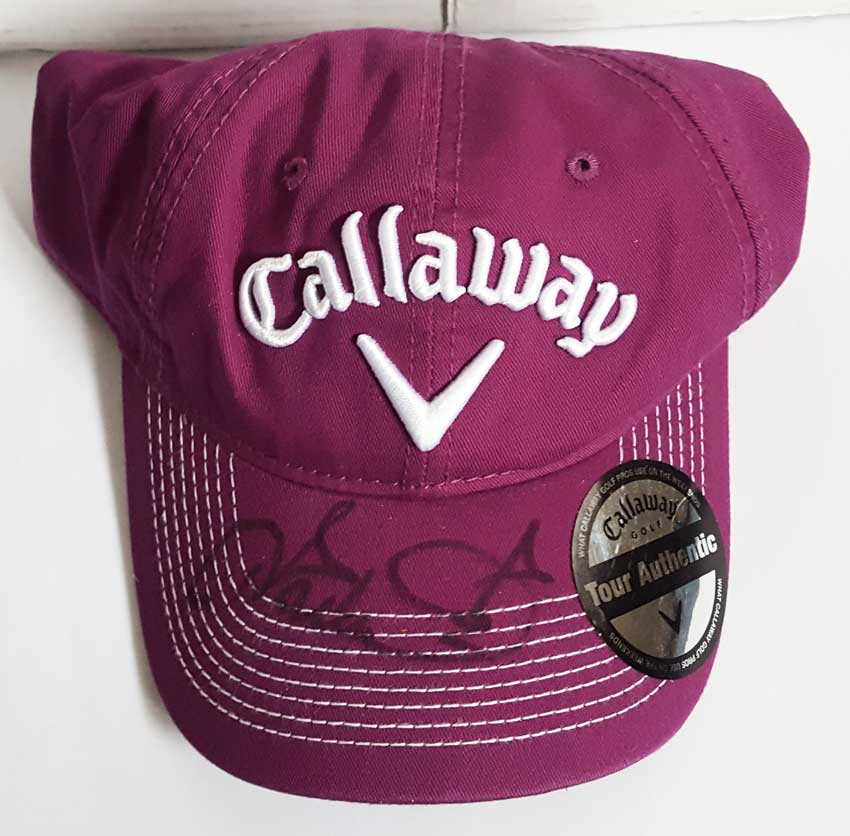 Ian Poulter signed golf cap. Purple official Callaway golf cap autographed on the peak by flamboyant