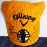 Ian Poulter signed golf cap. Orange official Callaway golf cap autographed on the peak by flamboyant