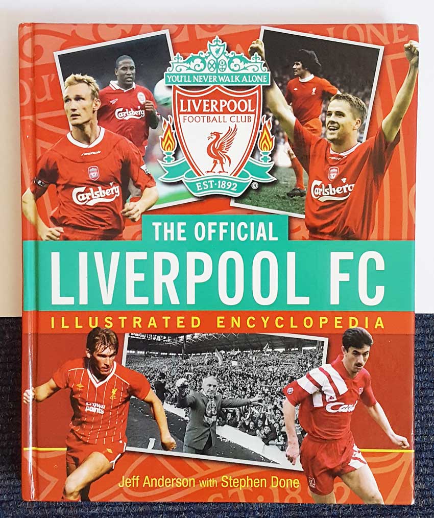 Mark Lawrenson signed book. Large hardback edition of the Official Liverpool FC Illustrated