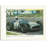 Stirling Moss and one other signed colour photo. Dedicated to Dave Good condition. All signed