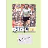 Franz Beckenbauer. Signature mounted with 10x8 picture. Professionally mounted in magnolia to 16x12.