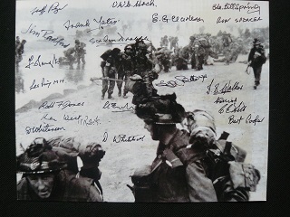 D Day Photo Signed 20 Normandy Veterans. 10 x 8 b/w photo signed by Gunner John Ainsworth - 10th