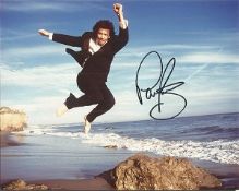 Music Autographs Collection 2. Eight autographed 8x10 musican photographs. Consists of Paul Young,