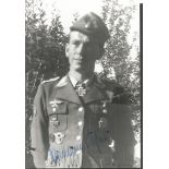 Luftwaffe ace Hermann Buchner signed photo. 6x4 black and white photo signed by Luftwaffe ace Herman