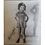 Shirley Temple Black signed 10 x 8 black and white full length portrait photo dated 1976 Good