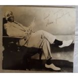 Louis Armstrong signed vintage 6 x 6 inch black and white photo, autograph a little light and a