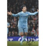 Sergio Arguero Signed Manchester City 8X12Photo Good condition. All items come with a Certificate of