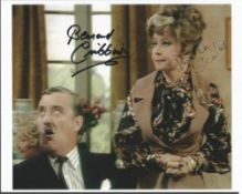 Prunella Scales and Bernard Cribbins signed 10x8 colour photo from Fawlty Towers Good condition. All