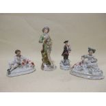 A pair of 19th century Staffordshire pottery groups together with two German figures (4)