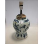 An 18th century blue and white Delft vase (a/f), adapted as a lamp