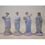 A set of four early 20th century continental porcelain figured ladies representing the Seasons (4)