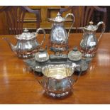 A four piece electroplate tea set and an inkstand