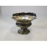 A Dutch silver swing handled bowl of campana shape, loaded, 13.5cm diameter