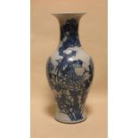 A late 19th century or early 20th century Chinese blue and white vase, 45cm high AND ANOTHER??