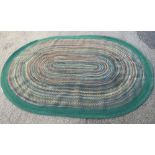 L.L. Bean, Maine, USA, a braided New England pattern rug 400 x 244cm (156 x 95in)