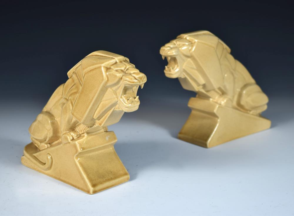 Percy Metcalfe, (British, 1895-1970) for Ashstead Pottery, a pair 'Lion of Industry' earthenware