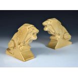 Percy Metcalfe, (British, 1895-1970) for Ashstead Pottery, a pair 'Lion of Industry' earthenware