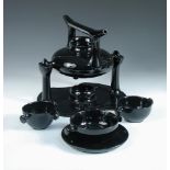 Luigi Colani for Friesland, Melitta, Germany, a black glazed 'Zen' tea service, designed 1973,