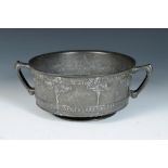 David Veazey for Liberty & Co., a Pewter twin handled rose bowl, cast in low relief with rose