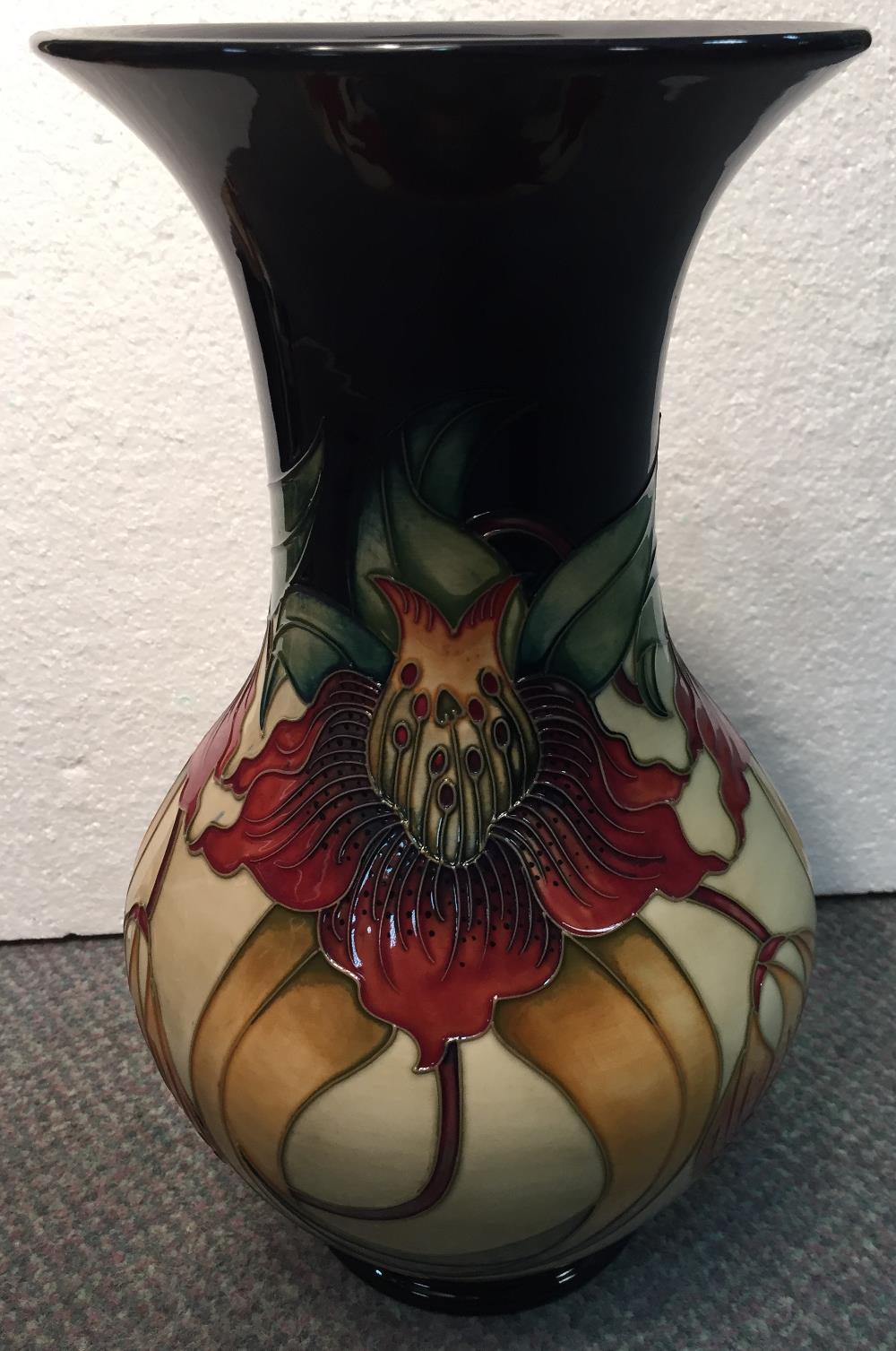 A large Moorcroft Anna Lily pattern vase, the baluster body with flared rim, painted and impressed - Image 2 of 3