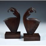 Attributed to Robj, a pair of Art Deco style carved wood dancing figures, each modelled as a