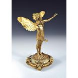 Franz von Stuck (German, 1863-1928) for WMF, a gilt metal figure of Cupid, modelled arms