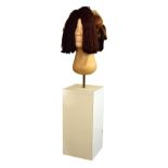 § Edward Lipski, (b.1966), Wig Head, fibreglass with horsehair mounted to a white pedestal base,