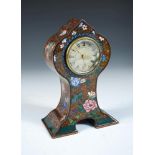 A cloisonné enamel cased mantle clock, decorated with flowers to an aventurine ground, the