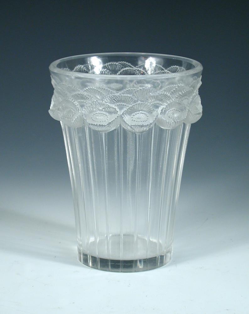 Bouton d'Or, a René Lalique glass vase, the flaring cylindrical body moulded in relief with band