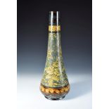 A large Doulton Lambeth Slater's patent bottle vase, the floral design with a cross-stitch effect, a