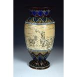 A Doulton Lambeth stoneware vase by Hannah Barlow, the baluster form incised with a young girl,