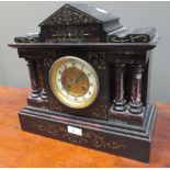 A Victorian black slate mantel clock, together with another